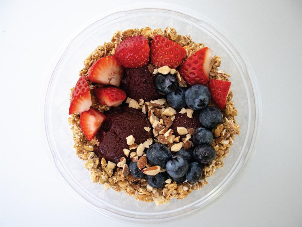 California Bowl · Brighten your day with our sunny California bowl, made with organic acai, almonds, granola, raspberries, blueberries, and honey.