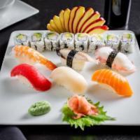 Sushi Deluxe · Nine pieces of chef's choice nigiri with one New York roll. Served with miso soup. 