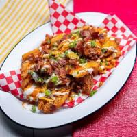 Nocturnal Tower - Buffalo Chicken Waffle F'd Fries · waffle fries topped with jack cheese, fried chopped buffalo chicken, bacon, scallions + ranch.
