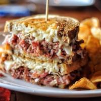 Reuben The Great Sandwich · Thin sliced corned beef, sauerkraut, Swiss cheese, and 1000 island dressing served on toaste...