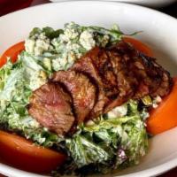 Black & Blue Salad · Grilled top sirloin atop fresh spring mix and iceberg blend tossed in bleu cheese dressing w...