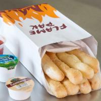 Bread Stix Combo · 8 sticks of freshly baked garlic bread topped with garlic butter & parmesan cheese with your...