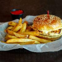 The Cluck Cluck Burger · House ground all white meat chicken burger mixed with sauteed peppers, onion and spices topp...