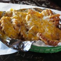 Loaded  Fries · Creole seasoned and topped with Monterey Jack and cheddar cheese, bacon, sour cream and gree...