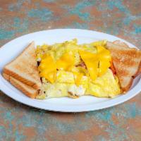 Western Omelet Breakfast · Served with toast. Ham, cheese, green pepper, tomato, onion and bacon.
