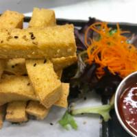 Crispy Finger Tofu · Fried tofu served with sweet chilli sauce. Vegetarian.