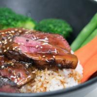 Beef Teriyaki Poke Bowl · Grilled teriyaki beef over steamed rice and steamed veggies.