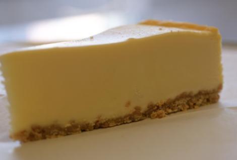 New York Cheesecake Slice · Original New York cheesecake is decadently rich in taste, It is also distinguished by a generous amount of sour cream used in the recipe.
