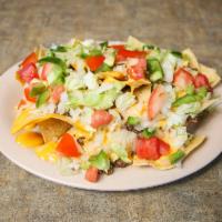 Nacho Supreme · Fried to order tortilla chips topped with ground beef, melted cheese, green peppers, chopped...