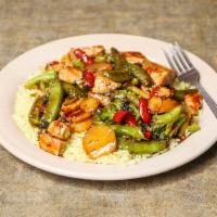 Chicken Stir Fry · Marinated chicken breast sauteed with vegetables in teriyaki sauce and served over rice or p...