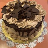 Chocolate Mousse cake · Chocolate cake with chocolate mousse, chocolate ganache.