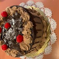 Black Forest cake · Chocolate cake ,  cherry filling , chocolate mousse.
