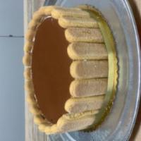 Large Tiramisu Cake · Coffee soaked cake filled with velvety coffee mascarpone cheese mousse garnished with lady f...