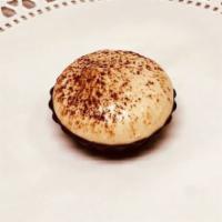Mini Tiramisu · Dark chocolate cup filled coffee flavored mascarpone cheese mousse garnished with cocoa powd...