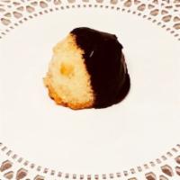 Mini Coconut Macaroon · Coconut macaroon dipped in rich chocolate ganache.