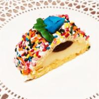 Mini Rum Savoy Pastries · Rum soaked cake rolled with Italian cream and chocolate Italian cream topped with whipped cr...