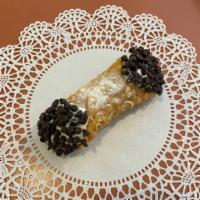 Large Chocolate Chip Cannoli · Large cannoli with ricotta filling and chocolate chips.