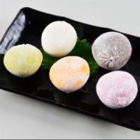 Coffee  Mochi Ice Cream · A small, round confection consisting of a soft, pounded sticky rice dumpling (mochi) formed ...