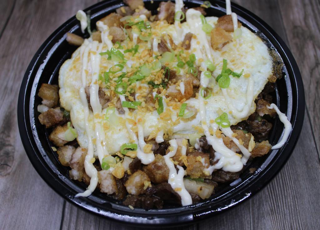 KBBQ Beef Sisig Bowl · Chopped flame-broiled boneless Korean BBQ beef tossed in a soy vinegar spiced sauce with diced onions and jalapeno. Topped with 2 fried eggs, Lechon kawali (fried pork belly) bits, fried garlic, scallions and truffle garlic aioli.