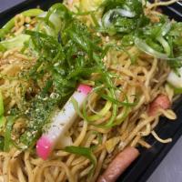 Hawaiian Fried Noodz · Fried season noodles with spam, fish cake, and cabbage. Topped with scallions and furikake.