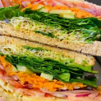 Rosina Health Sandwich · White cheddar cheese, spinach, tomato, carrot, alfalfa sprouts, cucumber, red onion, and hon...