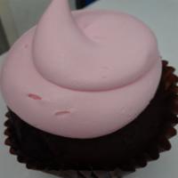 Pink Chocolate Cupcake · Chocolate cake topped with vanilla buttercream. 