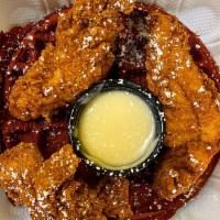 Red Velvet Chicken & Waffles 2 tenders · Red Velvet waffle paired with 2 crispy tenders and cream cheese syrup