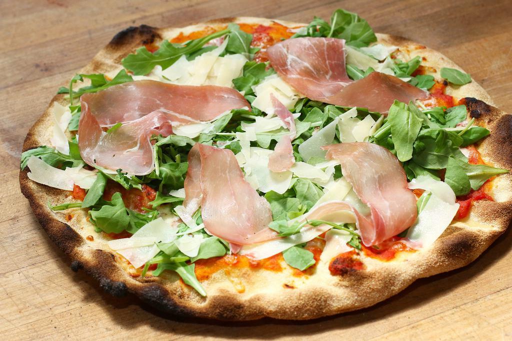 Woppos Pizza · Tomato, mozzarella, arugula, prosciutto San Daniele and Parmigiano cheese.