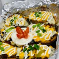 Steak Bomb Potato Skin · You must try it..
Amazing potato skins loaded with steak, mushrooms, peppers and onions topp...