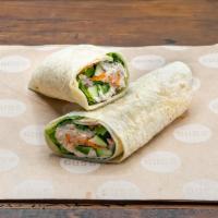 Banh Mi Wrap · Marinated Asian chicken with pickled vegetables and fresh jalapenos.
