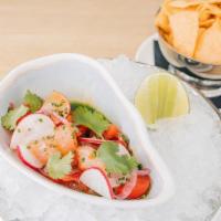 Red Chile Ceviche · Red Snapper that is mixed with heirloom cherry tomatoes, chile de agua, lime juice, chives, ...