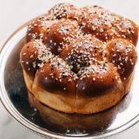 Everything Parker House Rolls · House bread seasoned with poppy seeds, sesame seeds, black sesame seeds, dried garlic, dried...