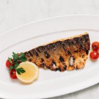 Spanish Branzino · Grilled with olive oil, served with our fire roasted tomatoes
