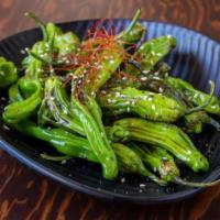 Tamari Shishito Peppers · Pan fried shishito peppers in flavorful tamari sauce, sprinkled with sesame seeds and sea sa...