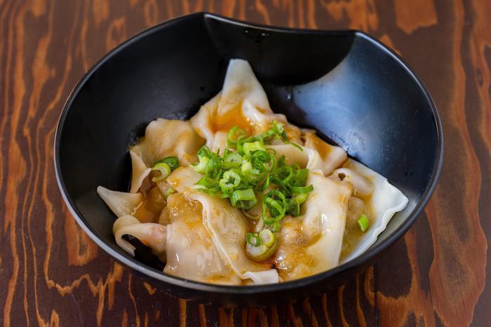 Homemade Japanese Wonton · Japanese tender pork and shrimp wonton in aromatic miso sauce and spicy red chili oil. Freshly made daily.