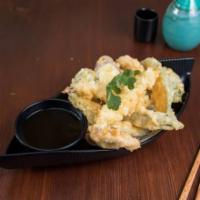 Prawns and Vegetables Tempura · Deep fried vegetables and prawns coated in a very light and airy batter that is fried to per...