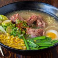 Shio Oxtails Ramen · Homemade noodles in shio oxtail broth, topped with oxtails, soft boiled egg, Brussels sprout...