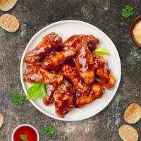 BBQ Bender Wings · Fresh chicken wings breaded, fried until golden brown, and tossed in barbecue sauce. Served ...