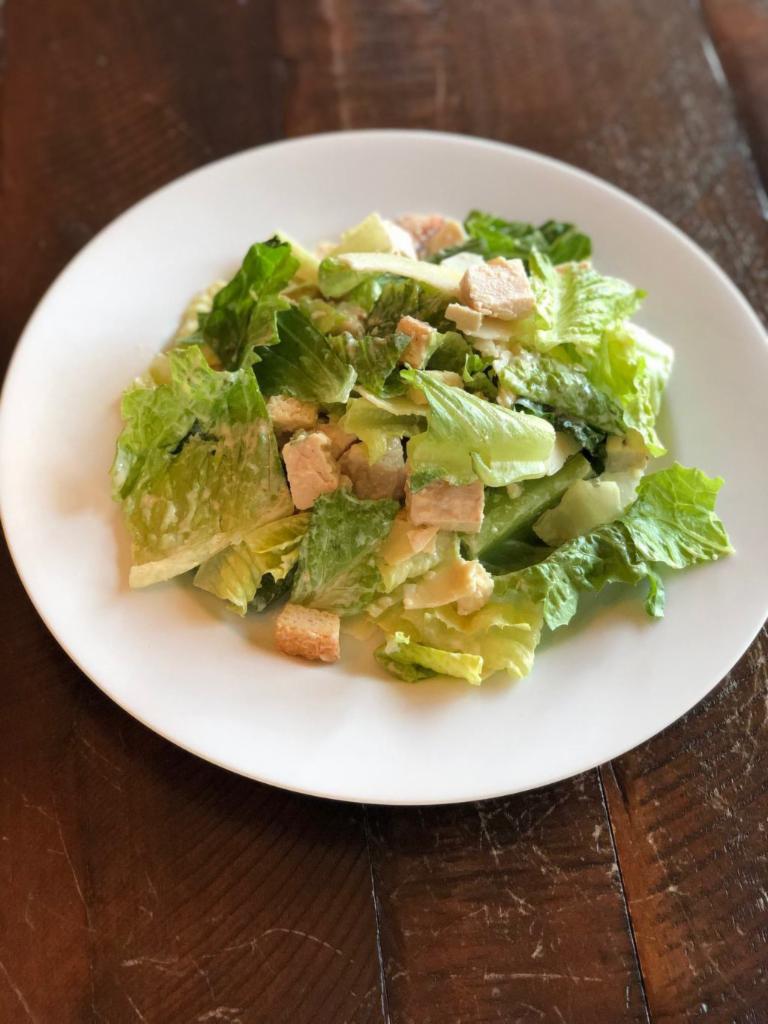 Caesar Salad with Grilled Chicken  · With grilled chicken breast, housemade croutons and housemade Caesar dressing.