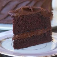 Aux Delices Homestyle Chocolate Cake · Home style chocolate cake filled with our home style chocolate frosting.