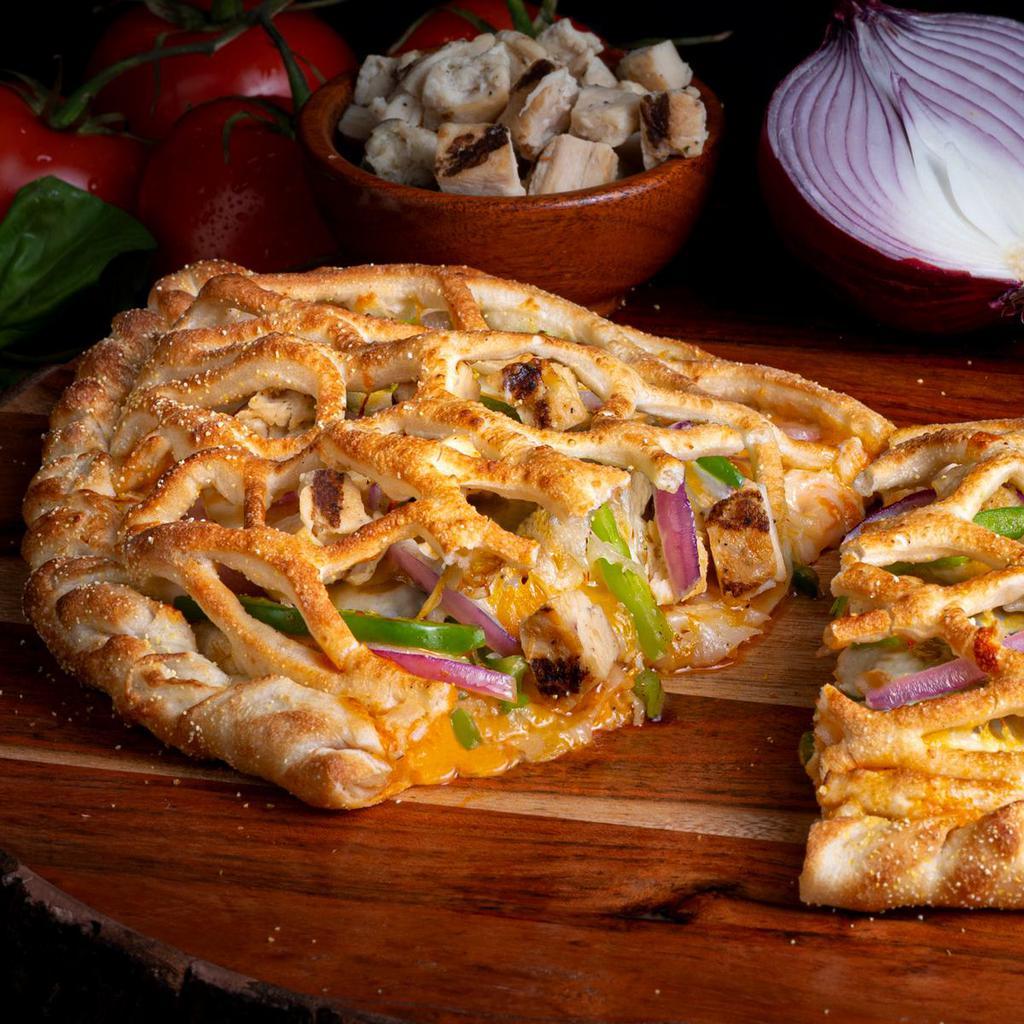 Monterey · Signature crust, garlic white sauce, frank’s redhot buffalo sauce, mozzarella, cheddar, garlic parmesan seasoning, all-natural grilled chicken, red onions, and green bell peppers.
