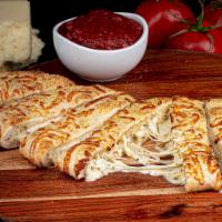 Garlic Stuffed Cheesy Bread · Signature crust, garlic white sauce, mozzarella, and garlic Parmesan seasoning. Served with ...