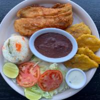 Fish Fillet/Filete de pescado · Comes with rice, green plantains, and salad. Con arroz, tajadas y ensalada.