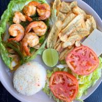 Shrimp in sauce/Camarones en salsa  · Comes with rice, green plantains, and salad. Con arroz, tajadas y ensalada.