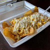 Tositi Esquite · Tostitos chips with corn, cheese, mayo, and other toppings of your choice!