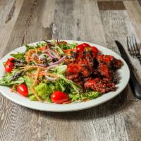 Marinated Sirloin Steak Tips · served with choice of 1 salad, fries, or rice