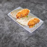Fajita Burrito · Your choice of steak or chicken.
Tomatoes, onions, green pepper and rice