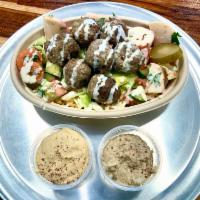 Kebab meatballs (all beef) · Comes with rice, lettuce, Israeli salad, hummus, baba ganouch and tahini.