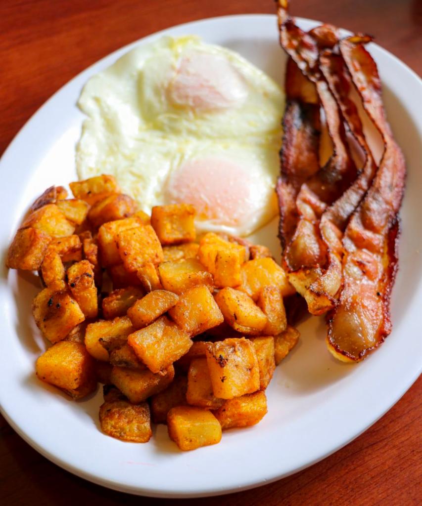 Meat & Eggs · Your choice of meat paired with 2 eggs cooked any style and a side of rice, potatoes or pancakes. 