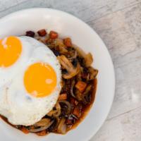 Hawaiian Style Loco Moco · Local beef patty on a bed of rice covered with brown gravy, mushrooms, onions and diced Port...